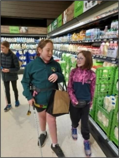Chevarni and Carrie orientating their way safely around the supermarket