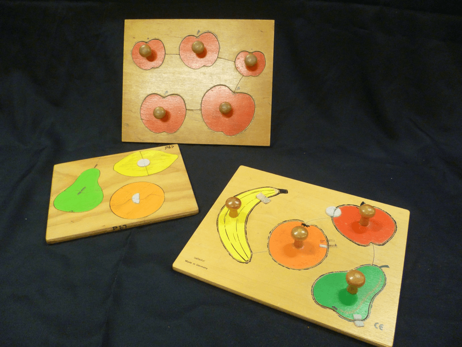 Three fruit puzzles - one with 3 pieces, one with 4 pieces and one with 5 pieces.