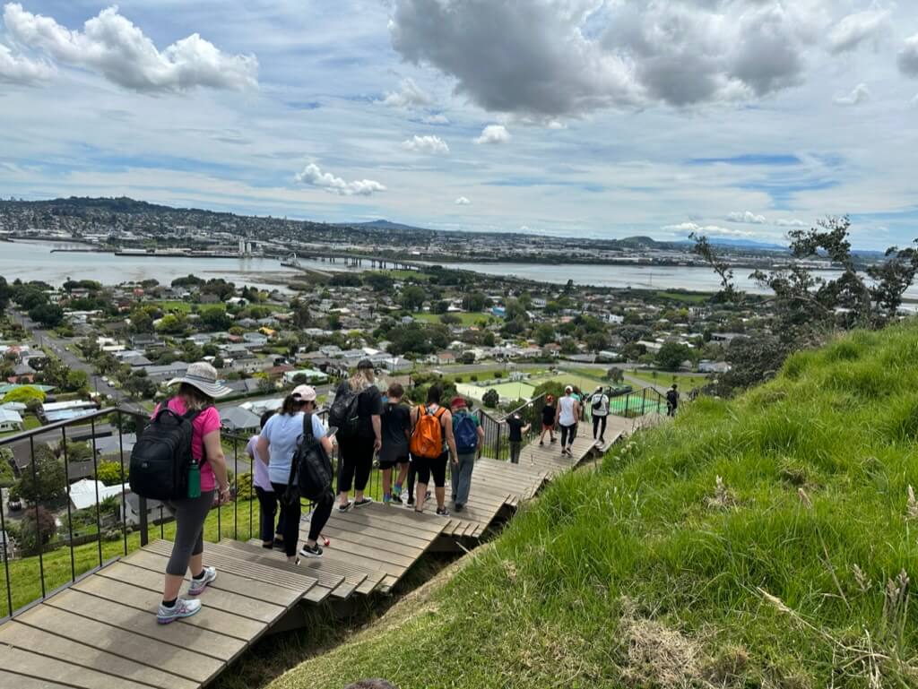 Immersion akonga and RTVs walking on Mangere Maunga 