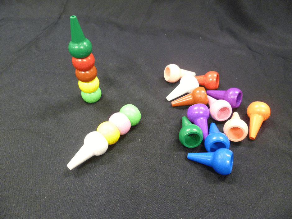 A set of coloured cones which are stackable.
